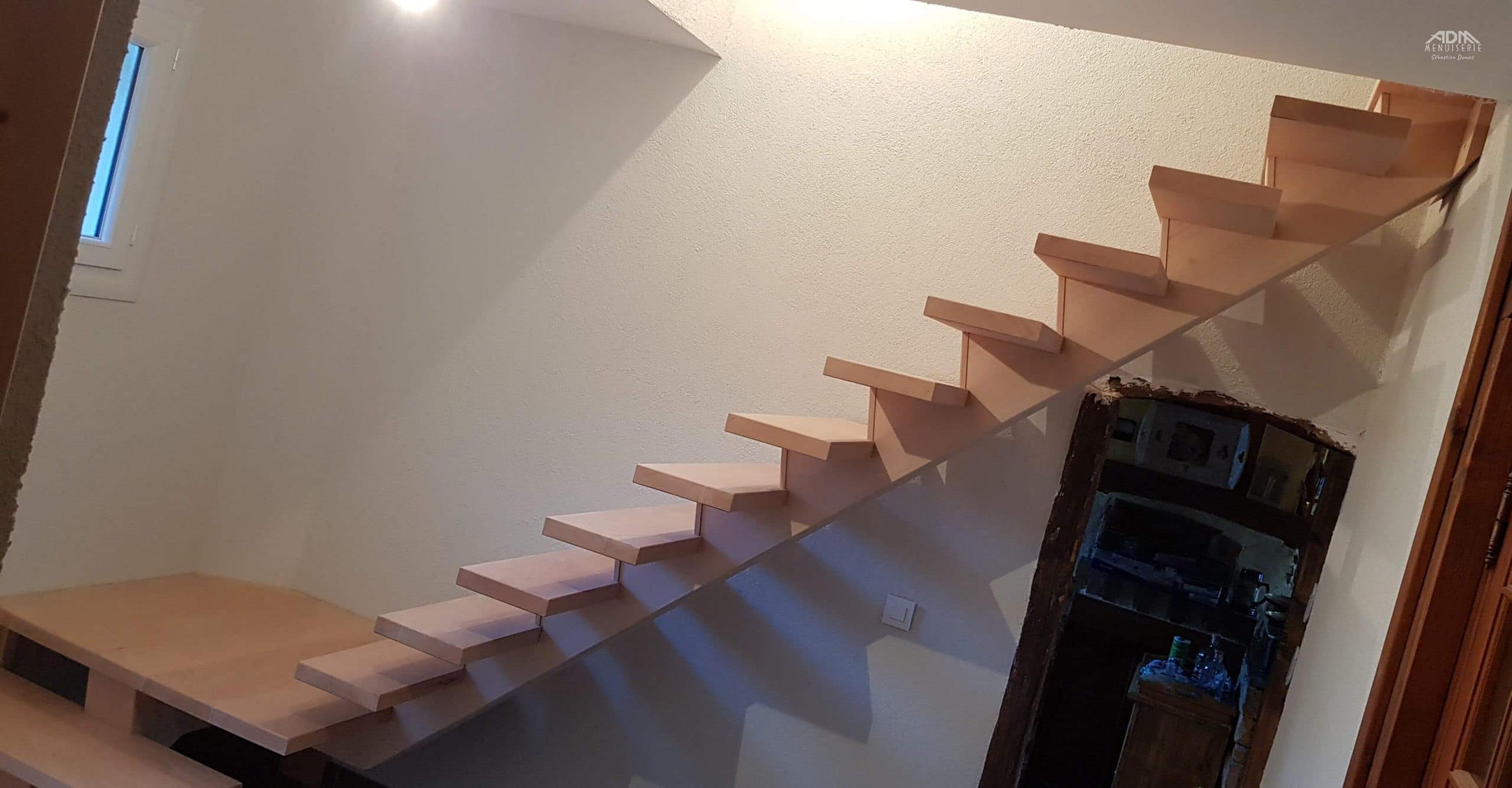 Fabrication sur mesure d'un escalier en hêtre à Groissiat
